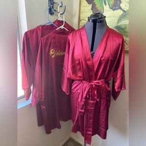 4 Maroon bridesmaids satin robes. Gold lettering. Kimono styleNever worn